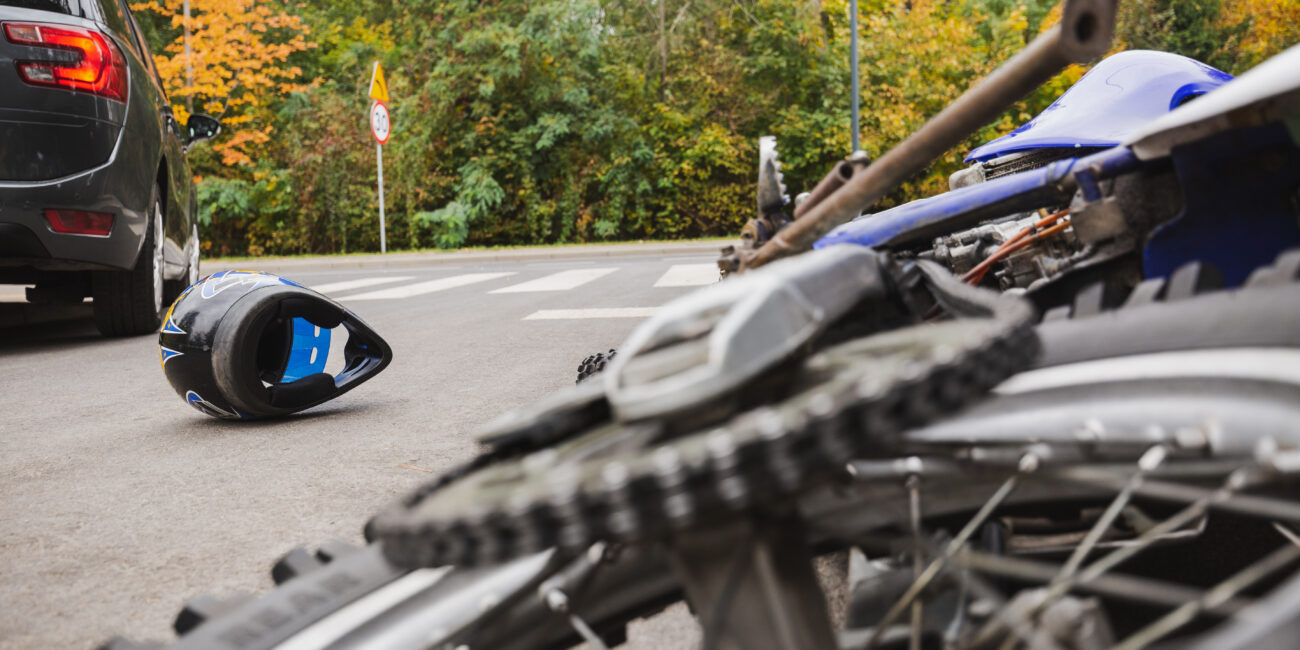 Close-up of bike and the car accident on the street