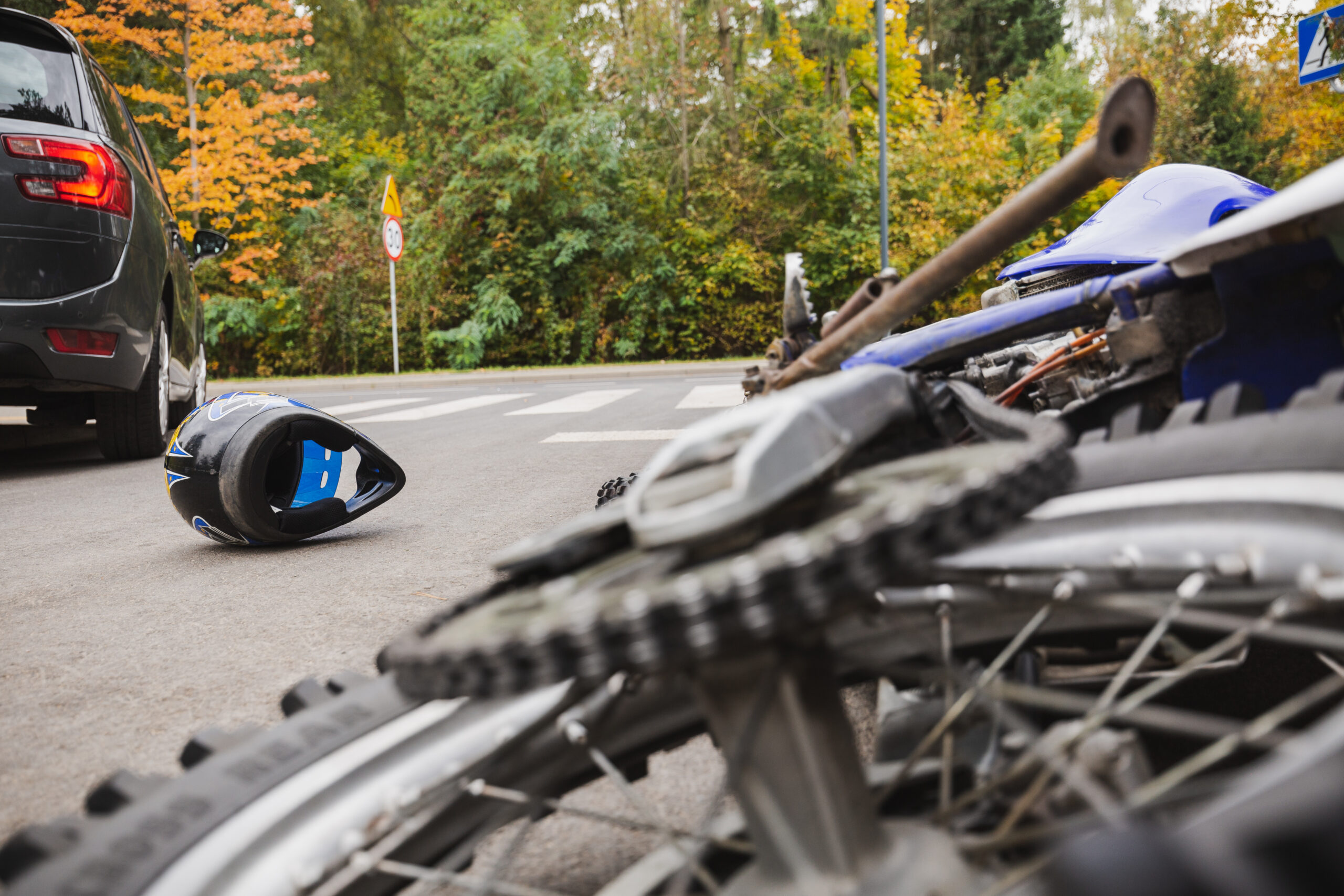 Close-up of bike and the car accident on the street